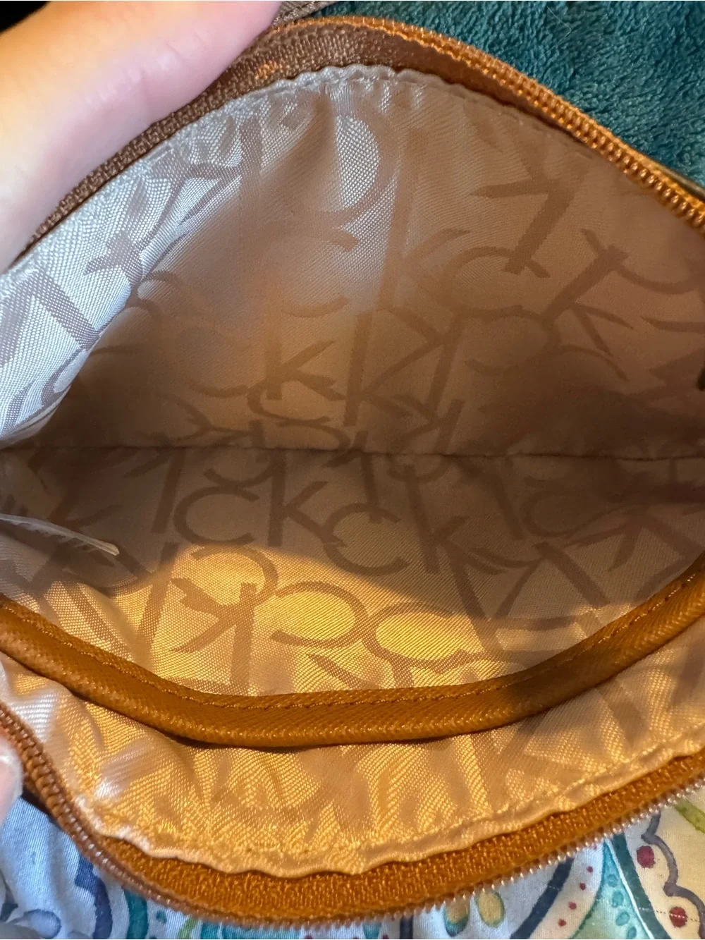 Calvin Klein White & Tan Logo wristlet with Gold Hardware